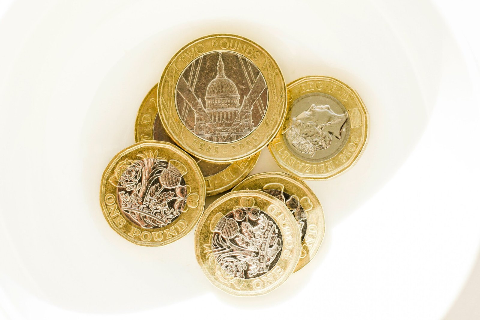 silver and gold round coins